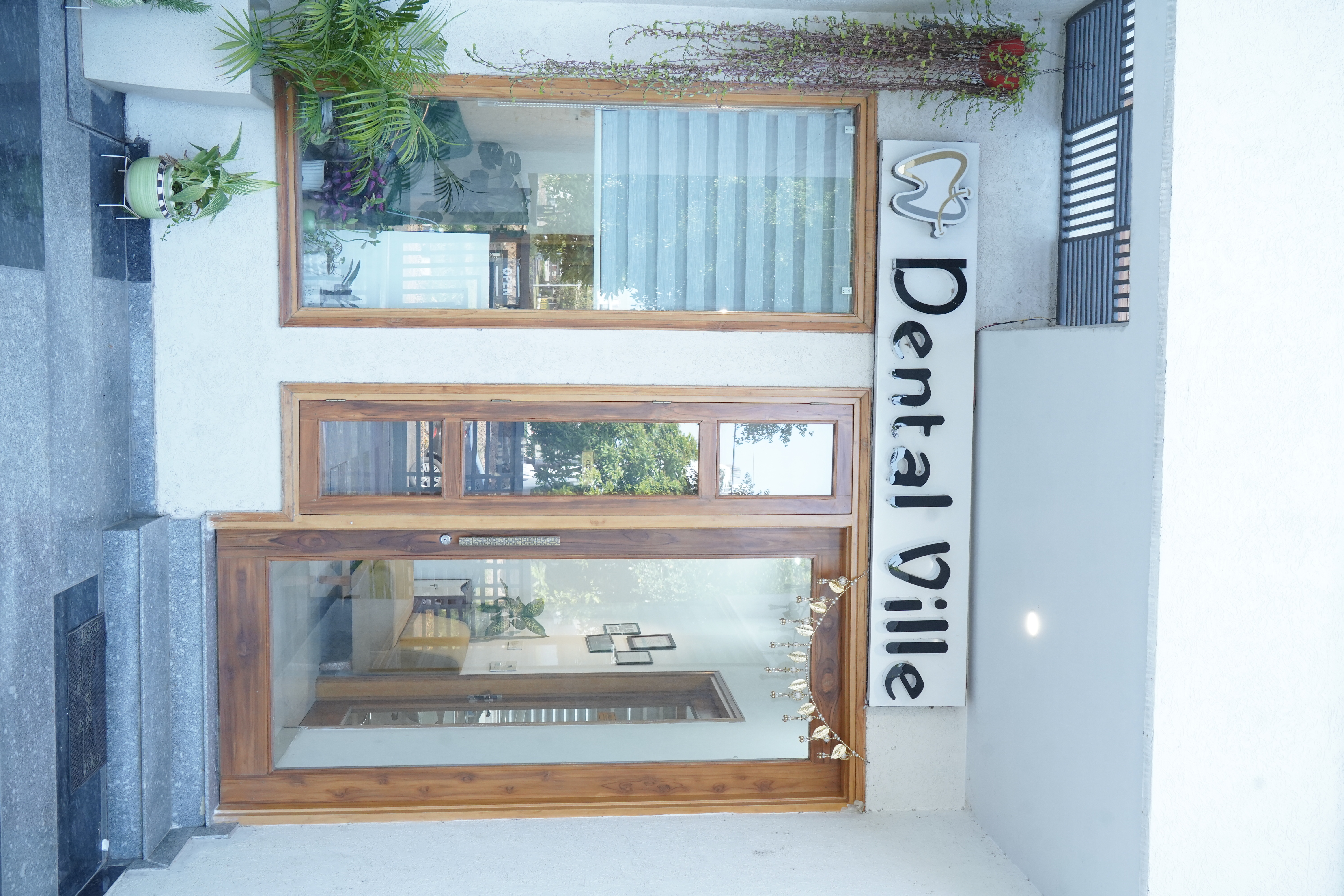Dental Ville clinic entrance and front glass area