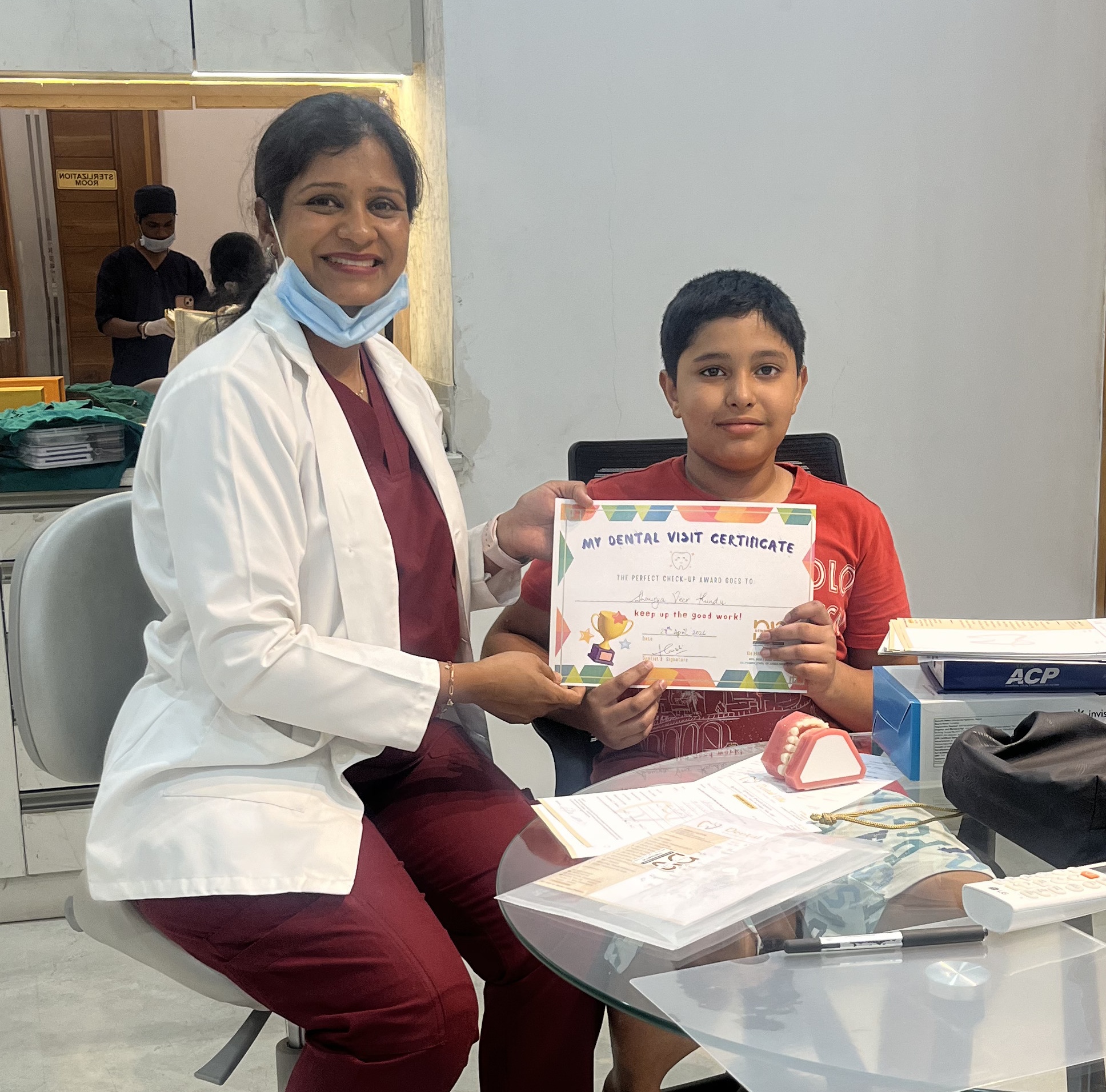 Female dentist explaining dental x-ray to an Indian patient